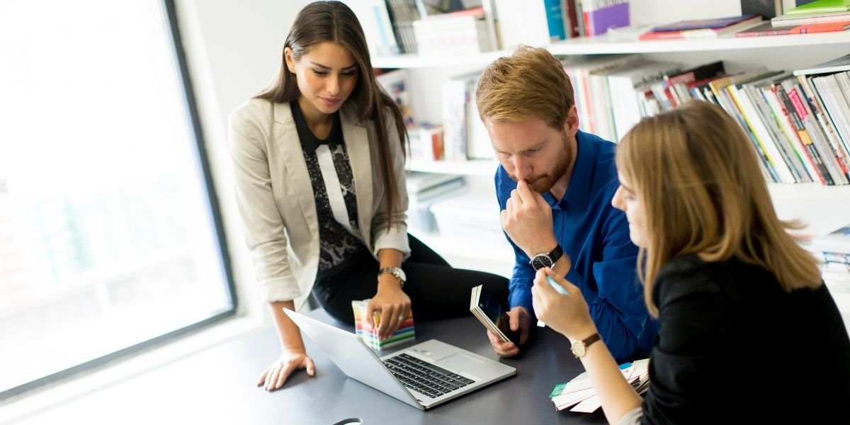 Three People Talking About Education Marketing Agency